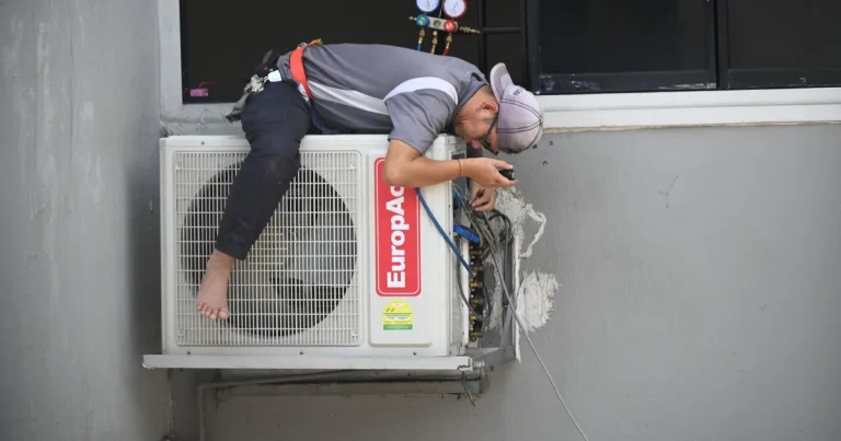 Technician handling apartment repairs in HCMC for a foreign tenant