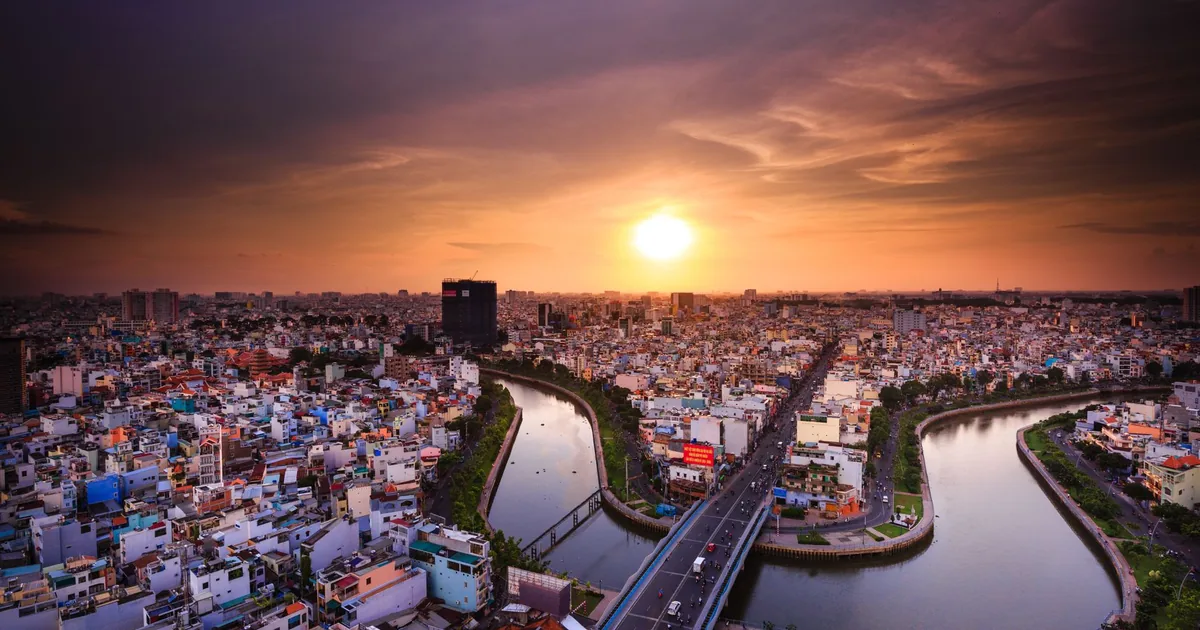 Ho Chi Minh City skyline at dusk, weighing a party vs family lifestyle in HCMC before renting
