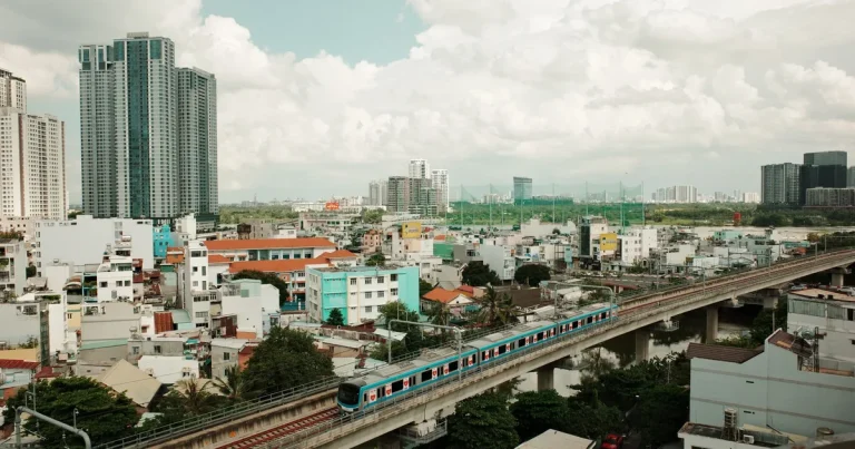 Apartments Near Metro Line 1 Ho Chi Minh City elevated train and towers